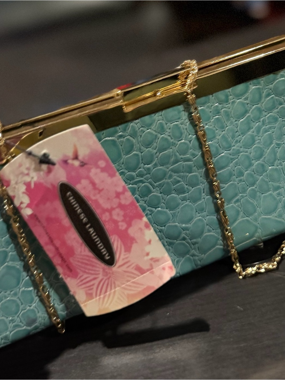 Chinese Laundry teal clutch with strap
